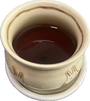 Photo of my teacup filled with lumber slut.