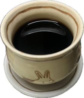 Photo of my teacup filled with 520 Jin.