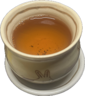 Photo of my cup filled with Airing the Linens.