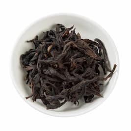 Snowflake queen tea leaves on a plate.