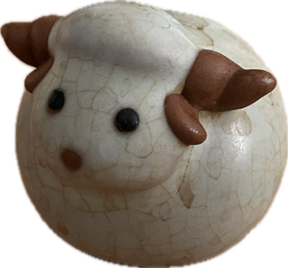 ceramic sheep facing left